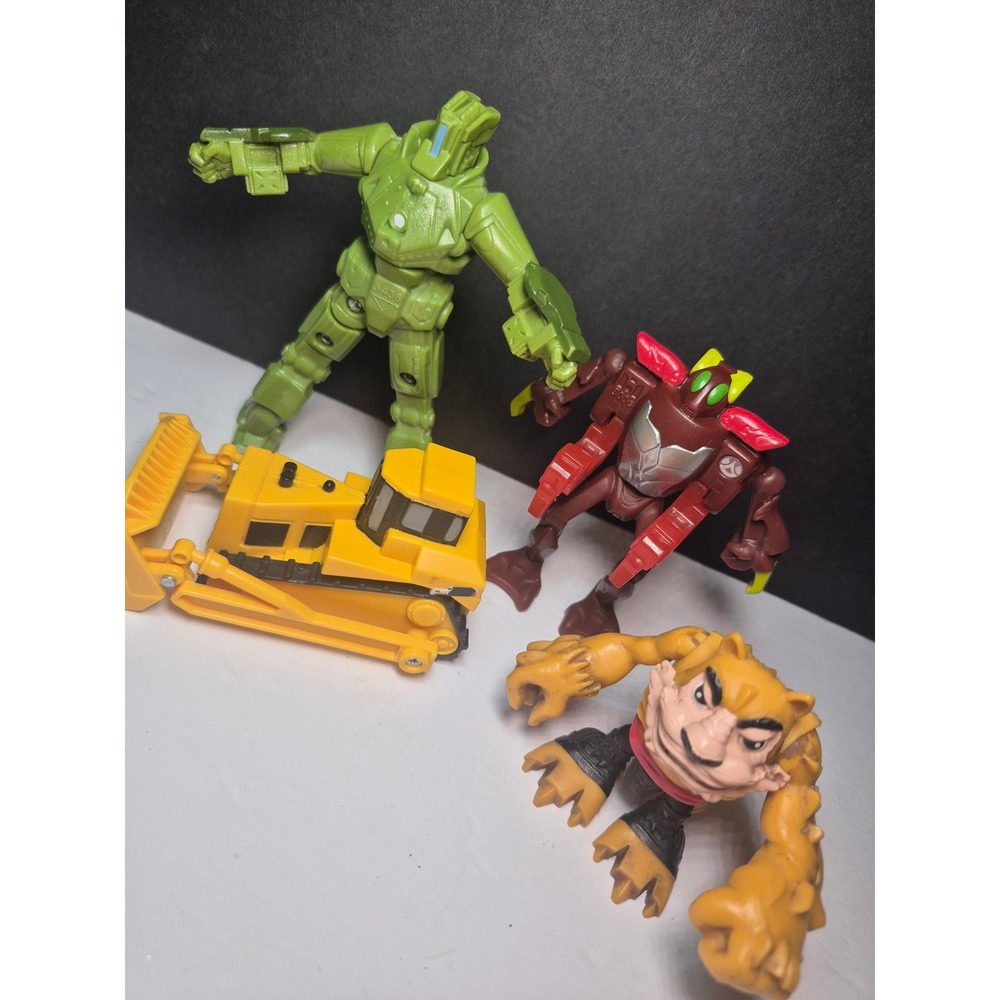 Mixed Action Figure Lot Green Mech Robot Maroon Warrior Yellow Bulldozer Monster